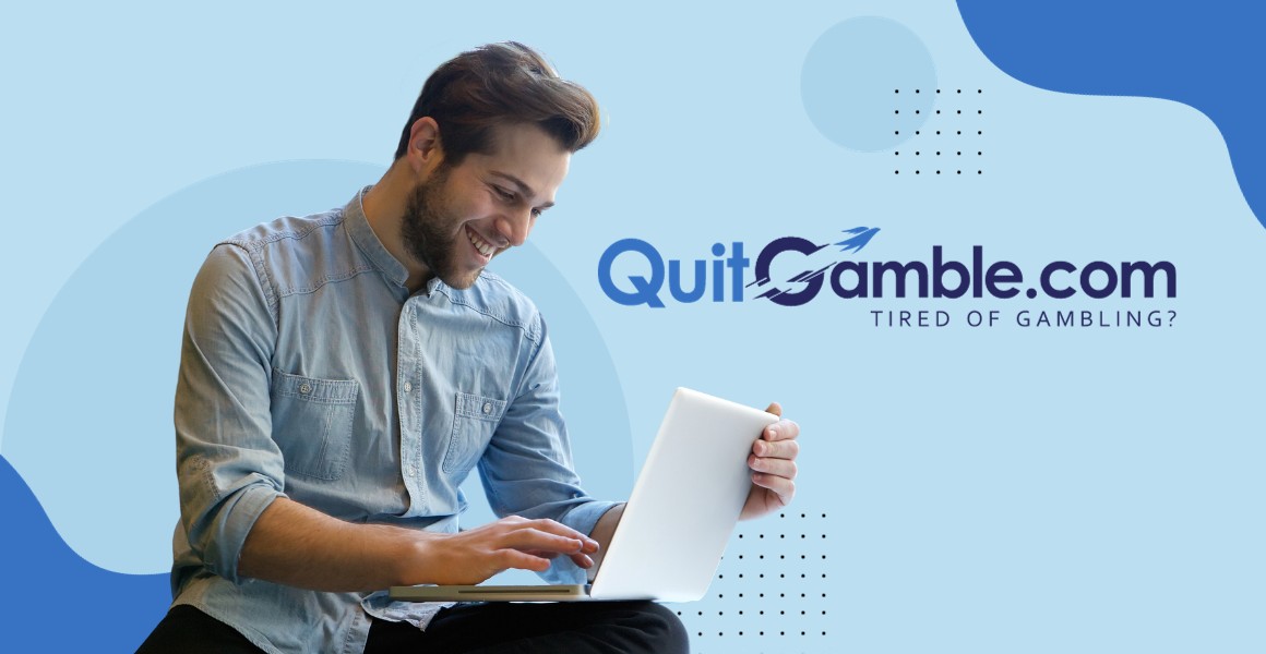 En man använder en bärbar dator med orden quiltgamble.com