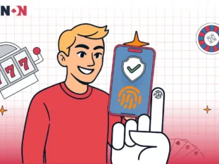 Man som verifierar sin identitet med biometriskt fingeravtryck på en mobiltelefon.